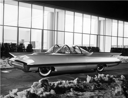 Against a background of the styling studios where it was conceived, the Lincoln Futura provides a hint of things to come in the automotive world. Designed by the Lincoln car stylists at Ford Motor Company's Engineering Center in Dearborn, Michigan, the Futura is a laboratory on wheels from which Lincoln-Mercury Division seeks to obtain valuable engineering data and test public reaction to styling innovations.