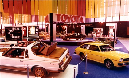 In the foreground of the Toyota exhibit is a 3/4 rear view of the CAL-1, a prototype Celica, with unique design elements.