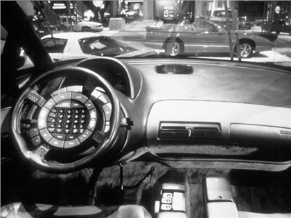 The dash of the Trans Sport features a dizzying array of buttons and gadgetry. A Head-Up Display and buttons on the steering wheel soon became production realities, though in the case of the Trans Sport concept van, the buttons remained stationary, while the wheel turned.