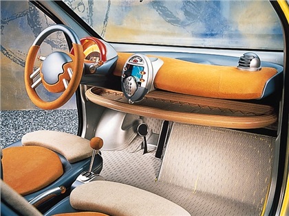 Interior: Twin-airbags are standard. The passenger's seat are placed a bit behind the driver's. The colors a la Twingo.