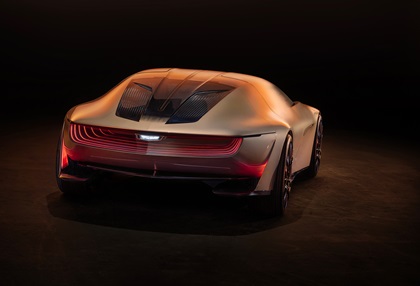 Rear view of Cadillac Opulent Velocity concept vehicle in Gilded Pearl exterior color.