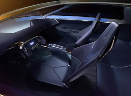 Interior of Opulent Velocity concept vehicle with Selene Metallic dark blue interior, Y-shape steering wheel and HUD screen.