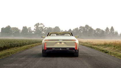 Rear view of Cadillac SOLLEI concept vehicle with Sunburst motif upper rear taillamp lit graphic
