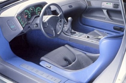 The 1988 Peugeot Oxia concept car interior drew on solar cells for electrical power. The dashboard included a computer and a map display.