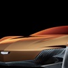 Close-up view of Cadillac Opulent Velocity concept vehicle’s dramatic draped front fascia in Gilded Pearl exterior color.