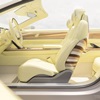 Side view of Cadillac SOLLEI concept vehicle interior in bespoke Sola Yellow Iridescent