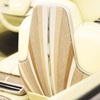Close up of Cadillac SOLLEI’s passenger side rear seating featuring Sunburst motif wood decor