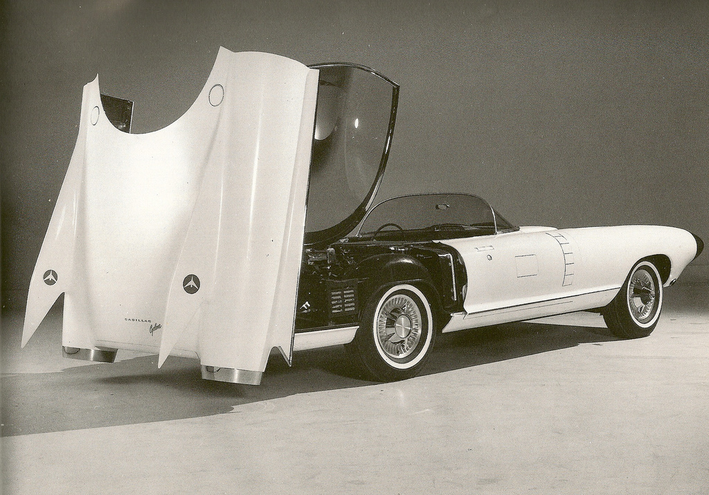 Cadillac Cyclone used vaporized silver to deflect sun's rays. Fully powered plastic canopy easily disappeared in trunk when not in use.
