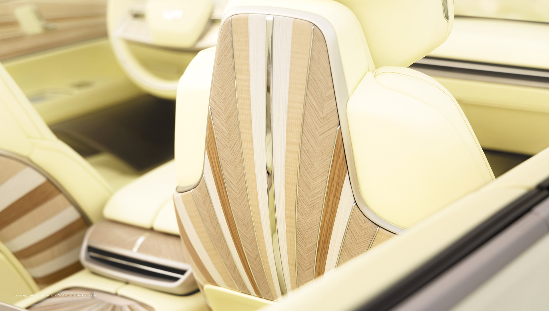 Close up of Cadillac SOLLEI’s passenger side rear seating featuring Sunburst motif wood decor