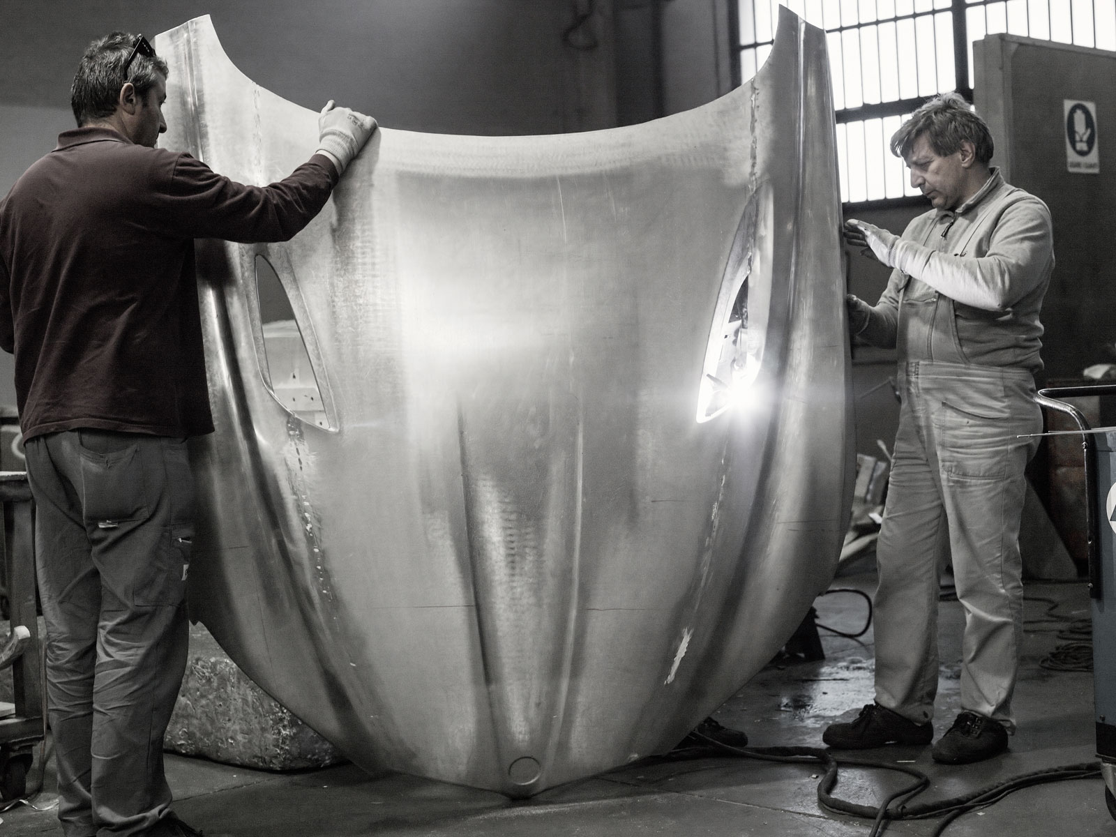 BMW Zagato Coupé, 2012 - Craftsmen working on the handcrafted aluminum hood